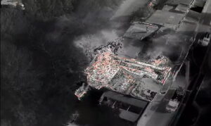 An aerial drone shot, in a thermal image mode, showing the fire in a derelict building in Willenhall.